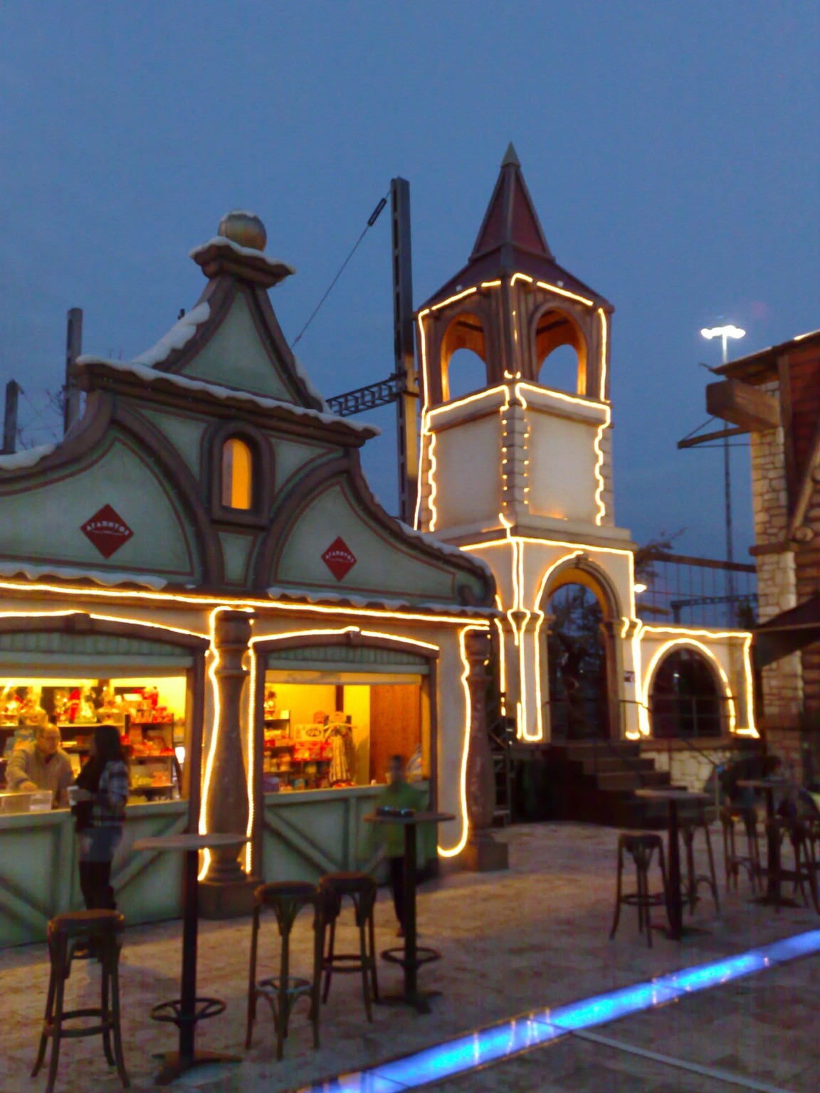 Illuminated themed park facade